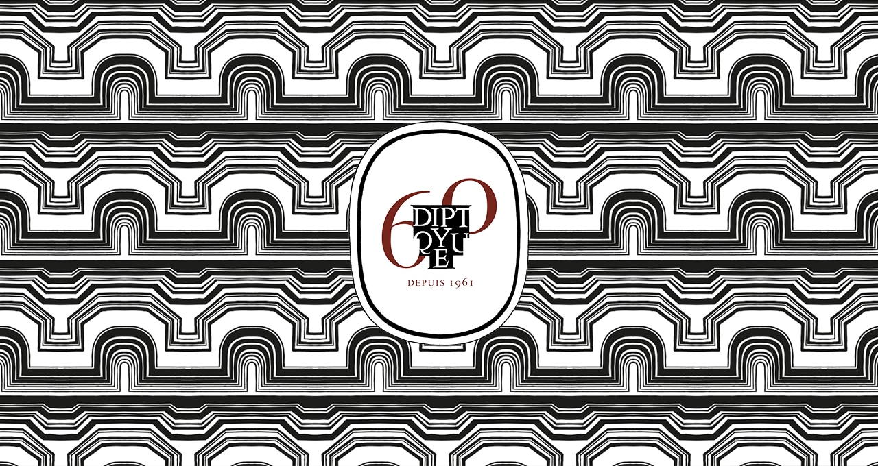 Diptyque 60 Depuis 1961と書かれたアニバーサリーロゴとパターン背景